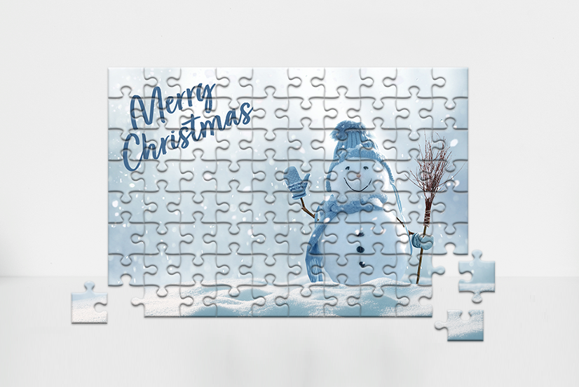 Puzzle klein winterlich bedruckt mit Schneemann und Schriftzug Merry Christmas